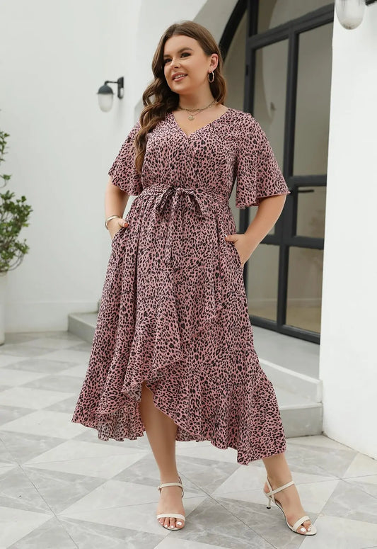 Plus size floral maxi dress for women enjoying spring.