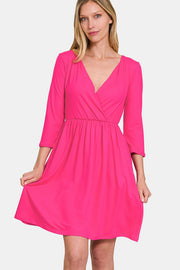 Zenana Three-Quarter Sleeve Surplice Dress with Pockets - Fashionmj